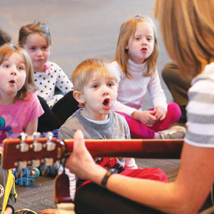 Preschool Kids Singing with Music Teacher